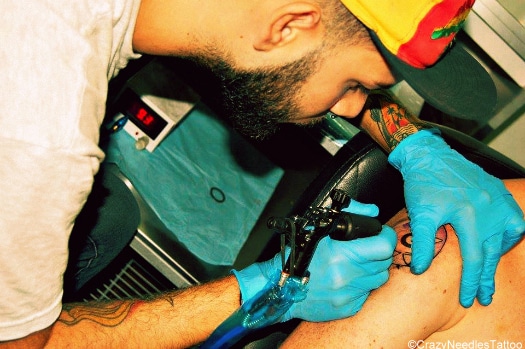 Carlos Ojeda is one of Crazy Needle Tattoo's main men